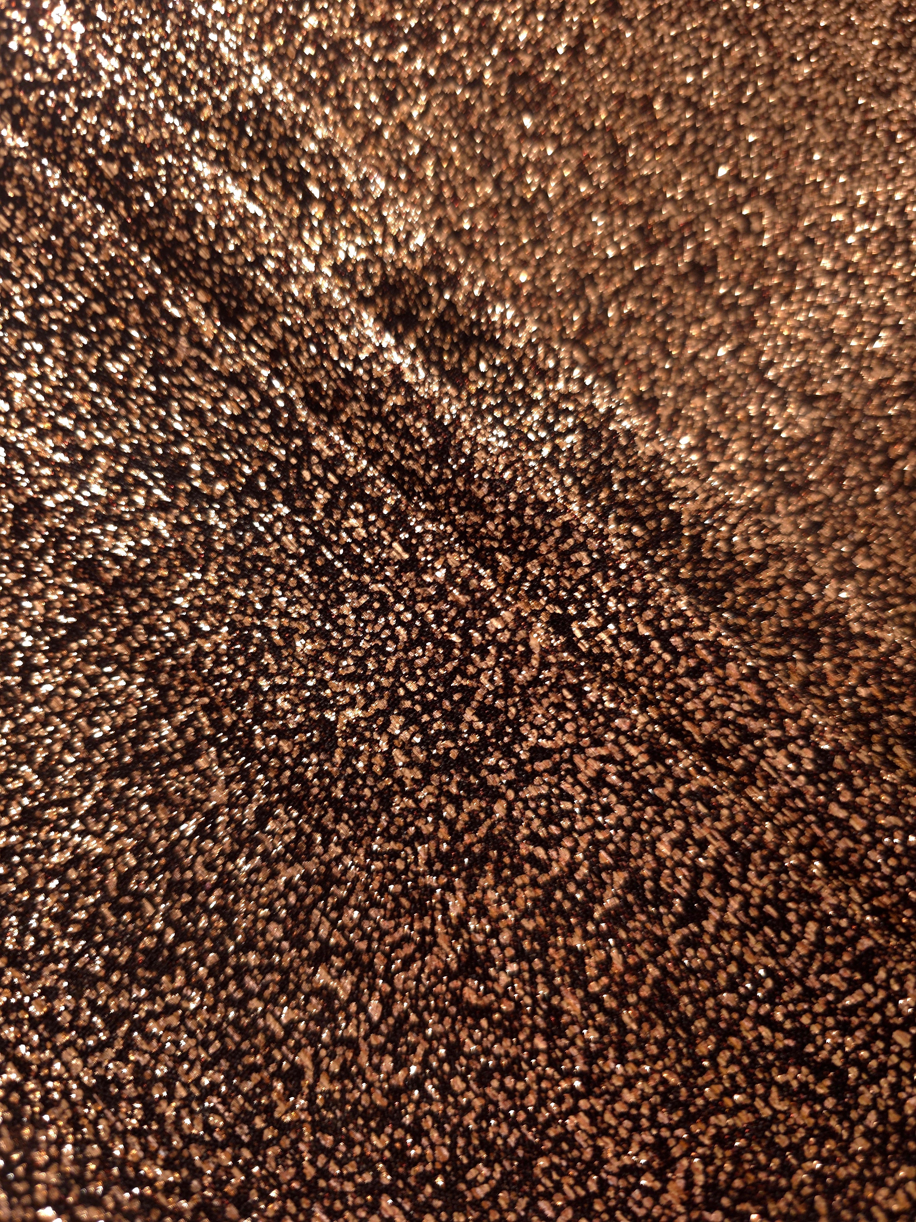 Layered Copper Bronze Sheer Glitter Stretch Tulle Fabric showing richer sparkle, soft depth and lightweight transparent folds