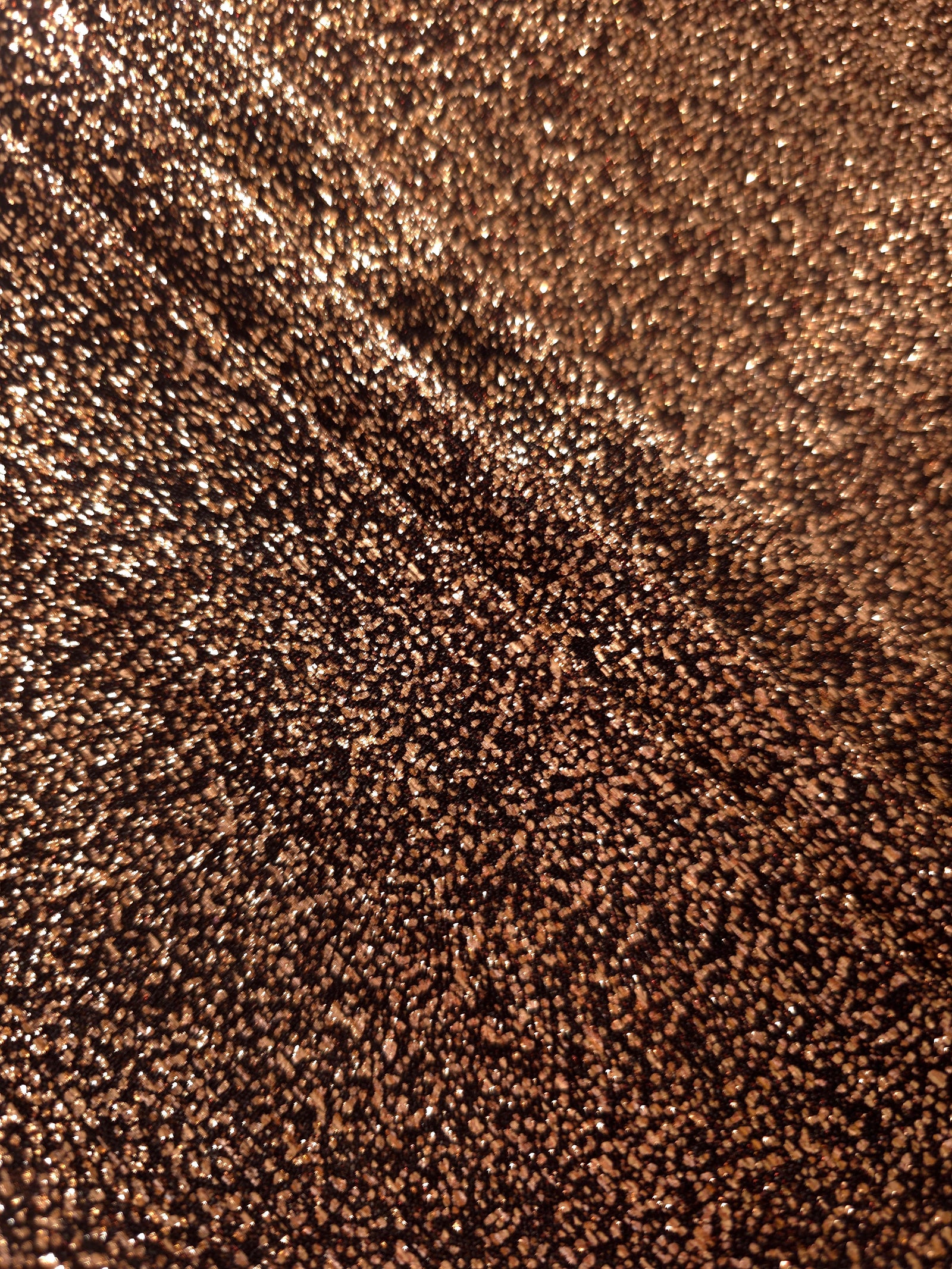 Layered Copper Bronze Sheer Glitter Stretch Tulle Fabric showing richer sparkle, soft depth and lightweight transparent folds