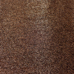 Surface detail of Copper Bronze Sheer Glitter Stretch Tulle Fabric showing glitter coverage across the fine sheer tulle base