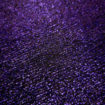 Close-up of Deep Violet Sheer Glitter Stretch Tulle Fabric highlighting all-over glitter, fine mesh texture and airy transparency