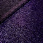 Front and back of Deep Violet Sheer Glitter Stretch Tulle Fabric showing transparent knit construction and flexible 4-way stretch