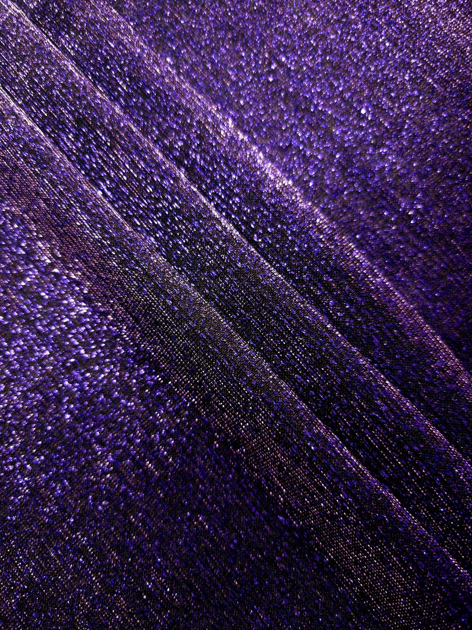 Layered Deep Violet Sheer Glitter Stretch Tulle Fabric showing richer sparkle, soft depth and lightweight transparent folds