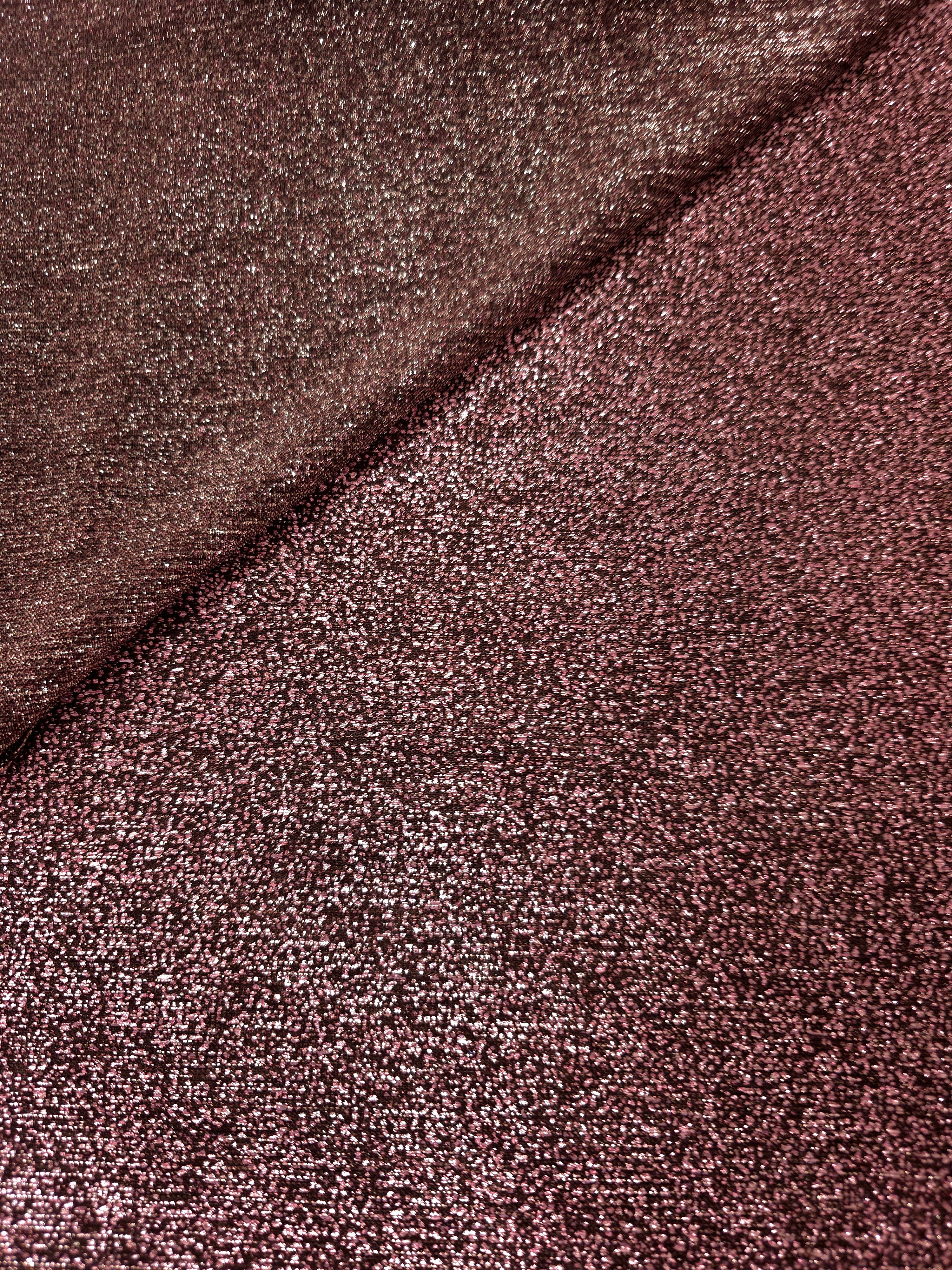 Front and back of Dusty Rose Sheer Glitter Stretch Tulle Fabric showing transparent knit construction and flexible 4-way stretch