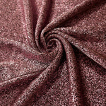 Swirl-draped Dusty Rose Sheer Glitter Stretch Tulle Fabric capturing reflective sparkle and fluid movement through flexible folds