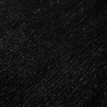 Close-up of Jet Black Sheer Glitter Stretch Tulle Fabric highlighting all-over glitter, fine mesh texture and airy transparency