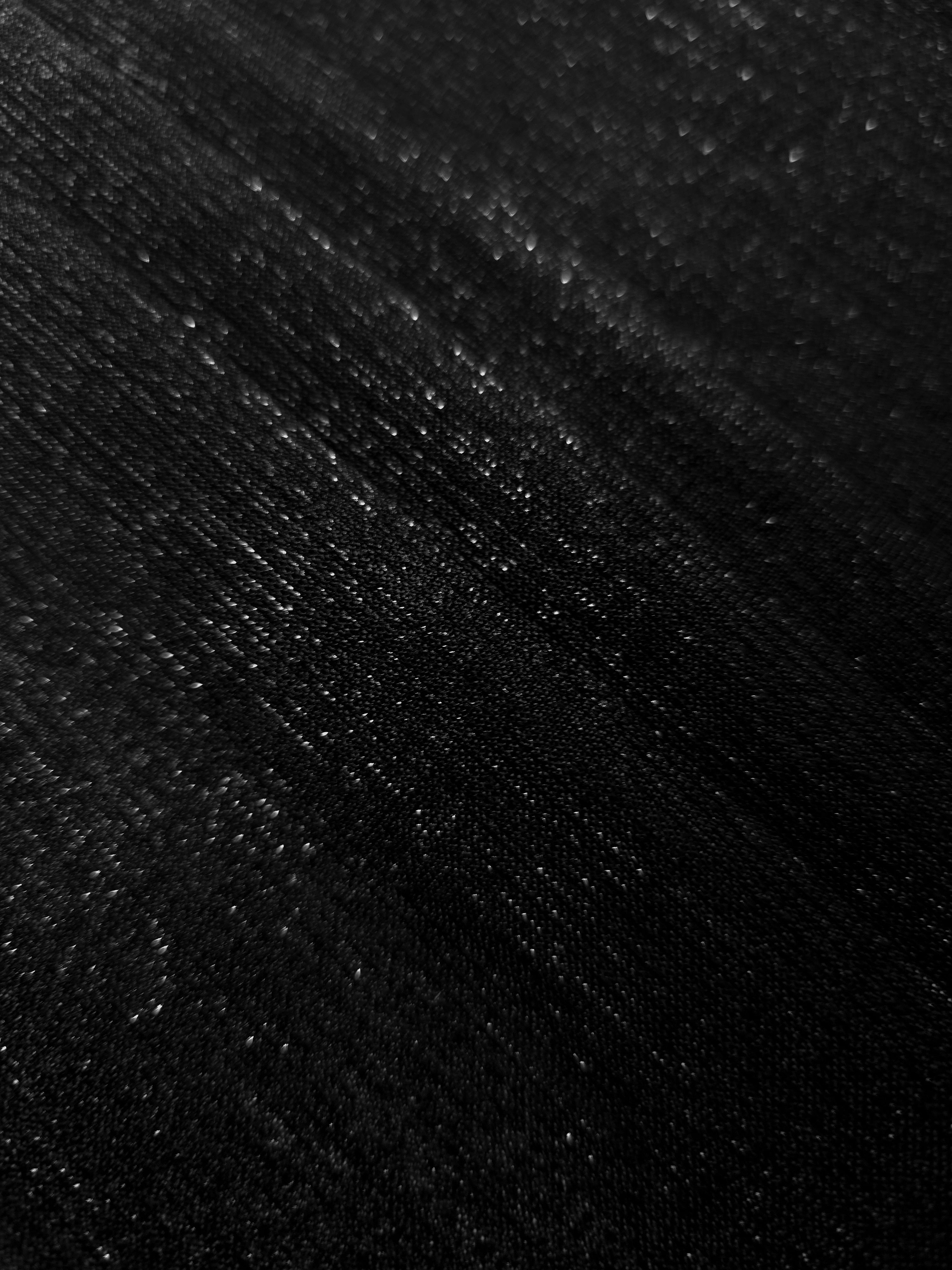 Layered Jet Black Sheer Glitter Stretch Tulle Fabric showing richer sparkle, soft depth and lightweight transparent folds