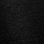 Surface detail of Jet Black Sheer Glitter Stretch Tulle Fabric showing glitter coverage across the fine sheer tulle base