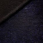 Front and back of Midnight Navy Sheer Glitter Stretch Tulle Fabric showing transparent knit construction and flexible 4-way stretch