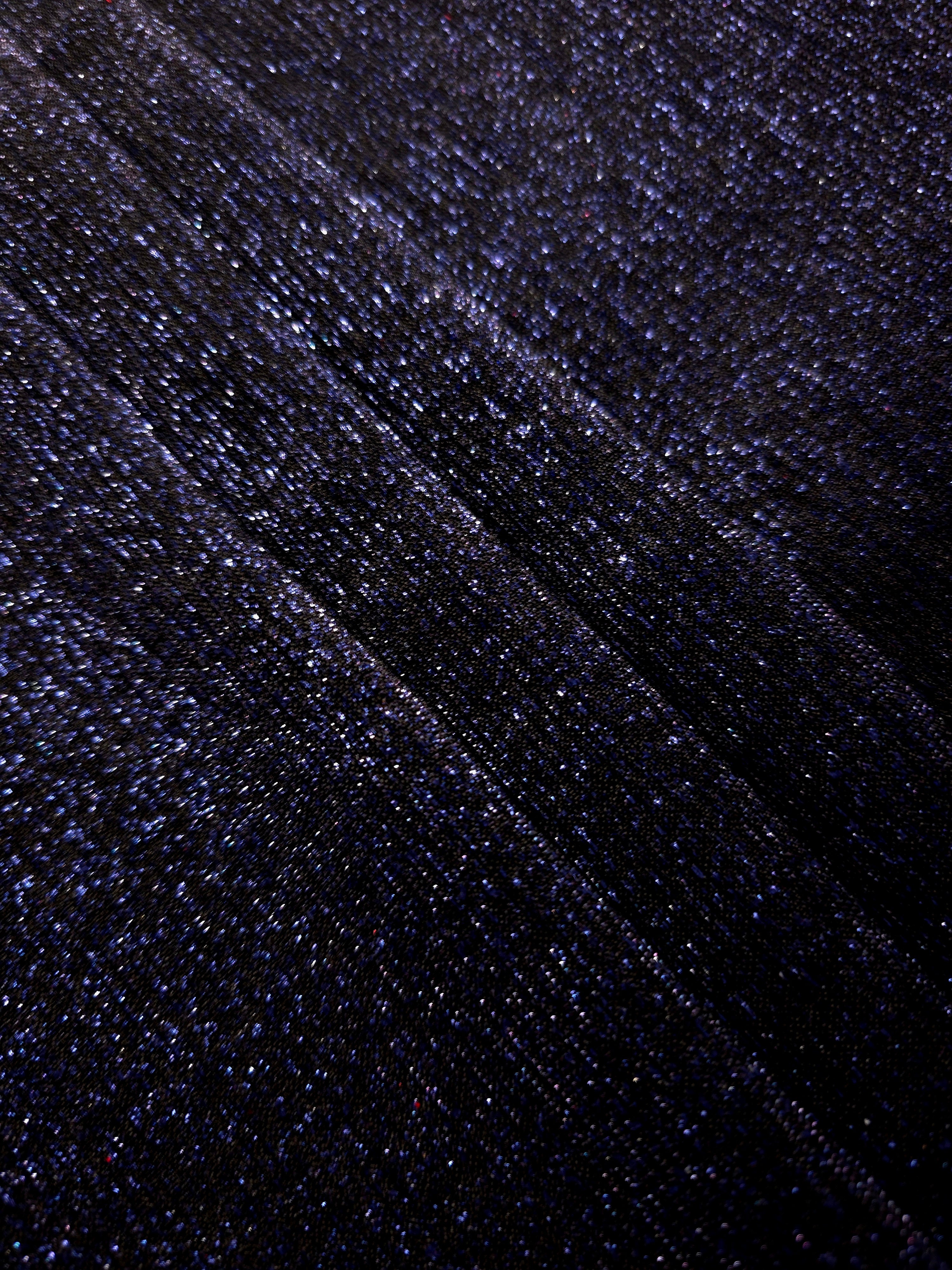 Layered Midnight Navy Sheer Glitter Stretch Tulle Fabric showing richer sparkle, soft depth and lightweight transparent folds