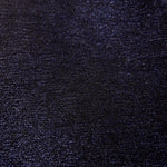 Surface detail of Midnight Navy Sheer Glitter Stretch Tulle Fabric showing glitter coverage across the fine sheer tulle base