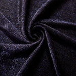 Swirl-draped Midnight Navy Sheer Glitter Stretch Tulle Fabric capturing reflective sparkle and fluid movement through flexible folds