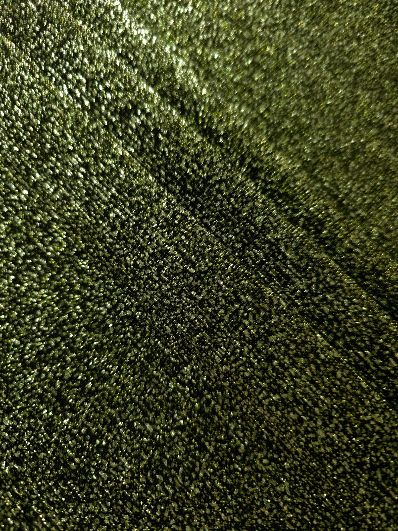 Layered Olive Green Sheer Glitter Stretch Tulle Fabric showing richer sparkle, soft depth and lightweight transparent folds