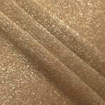 Layered Pale Gold Sheer Glitter Stretch Tulle Fabric showing richer sparkle, soft depth and lightweight transparent folds