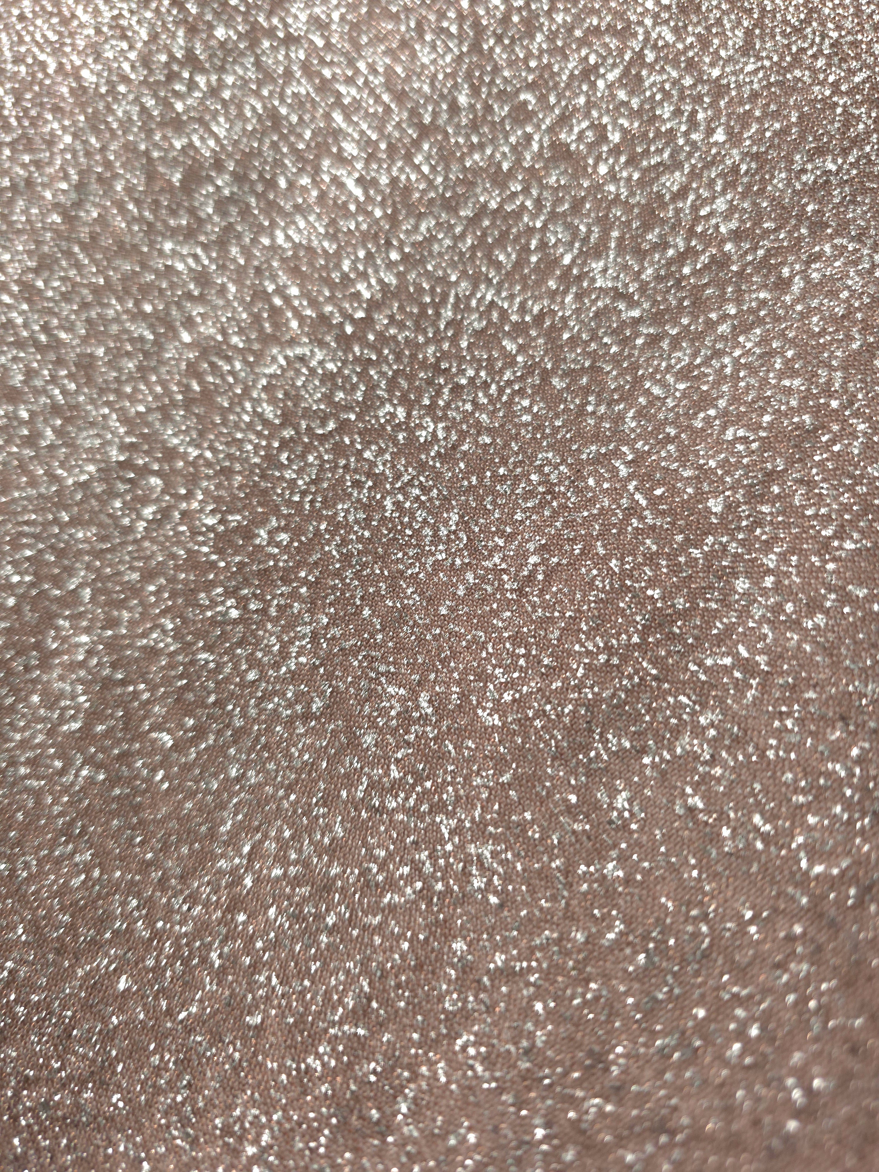 Close-up of Rose Taupe Sheer Glitter Stretch Tulle Fabric highlighting all-over glitter, fine mesh texture and airy transparency