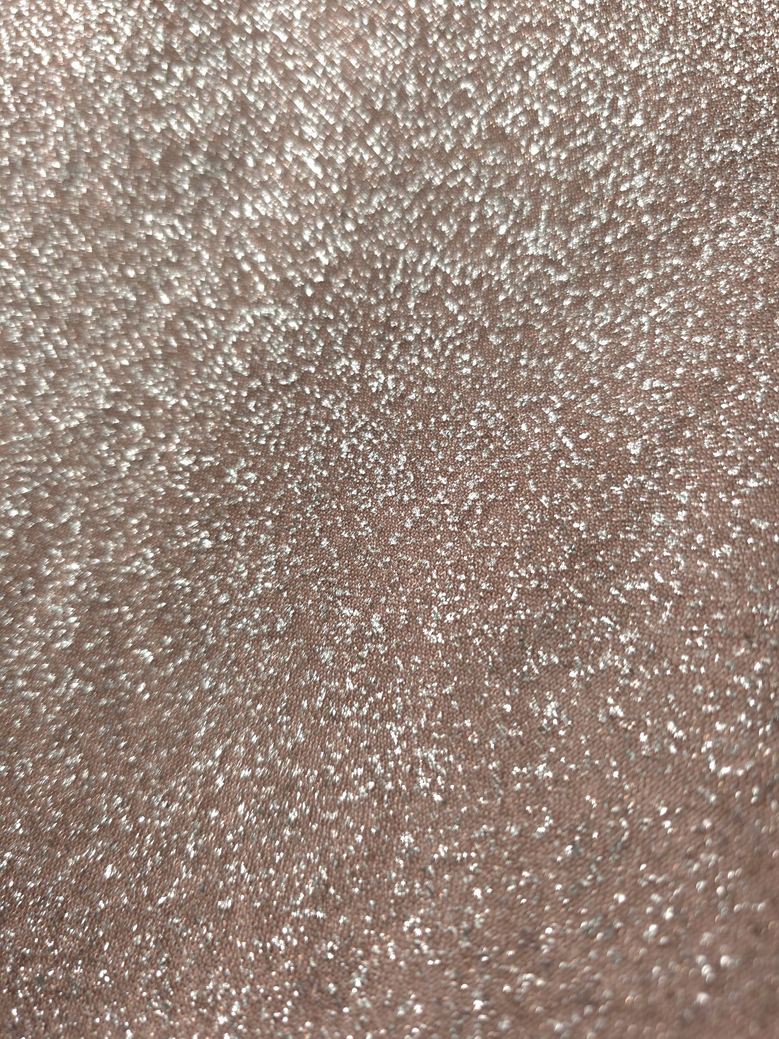 Close-up of Rose Taupe Sheer Glitter Stretch Tulle Fabric highlighting all-over glitter, fine mesh texture and airy transparency