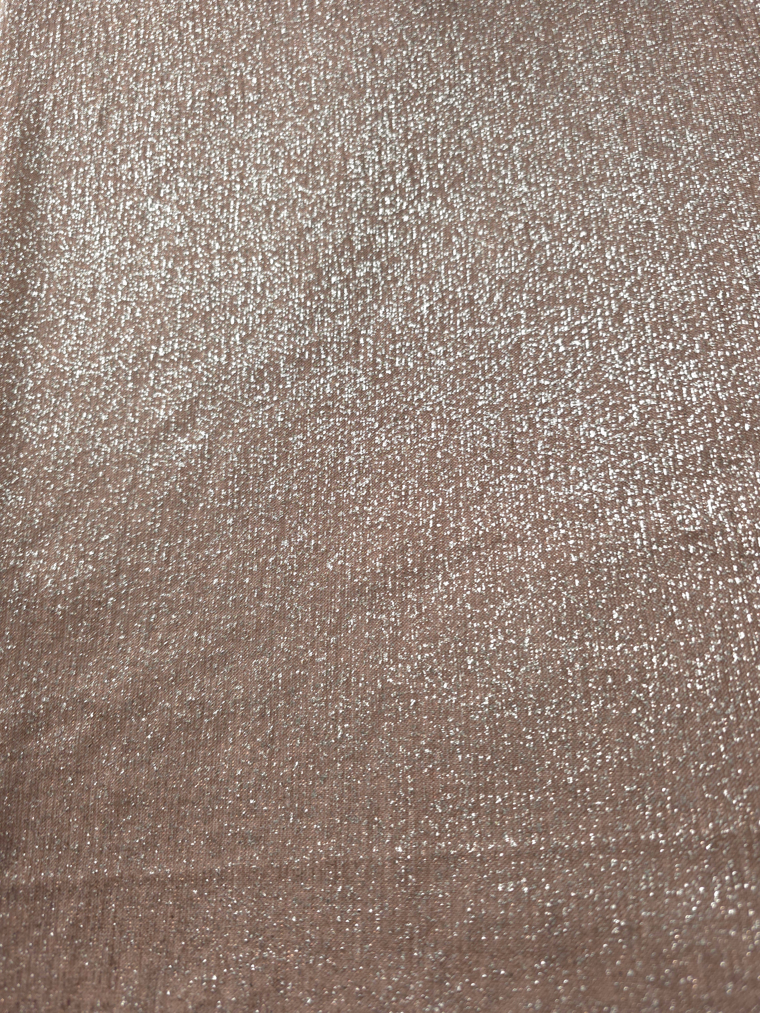 Surface detail of Rose Taupe Sheer Glitter Stretch Tulle Fabric showing glitter coverage across the fine sheer tulle base