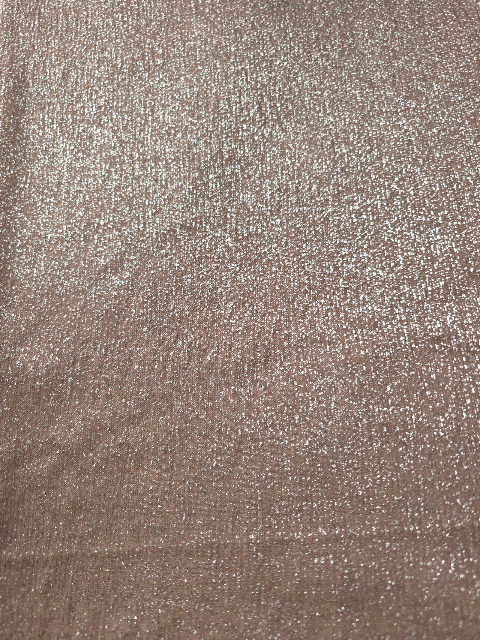 Surface detail of Rose Taupe Sheer Glitter Stretch Tulle Fabric showing glitter coverage across the fine sheer tulle base