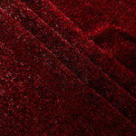 Layered Ruby Red Sheer Glitter Stretch Tulle Fabric showing richer sparkle, soft depth and lightweight transparent folds
