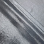 Steel Gray foiled spandex arranged in layered folds, displaying shimmer and soft structure for skirts, tops and performancewear
