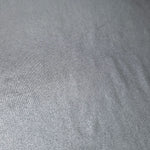 Steel Gray foiled stretch fabric texture close-up, displaying metallic reflection and fine surface character for apparel design