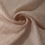 Draped Soft Beige Tencel jacquard showing airy movement for kaftans and dresses.