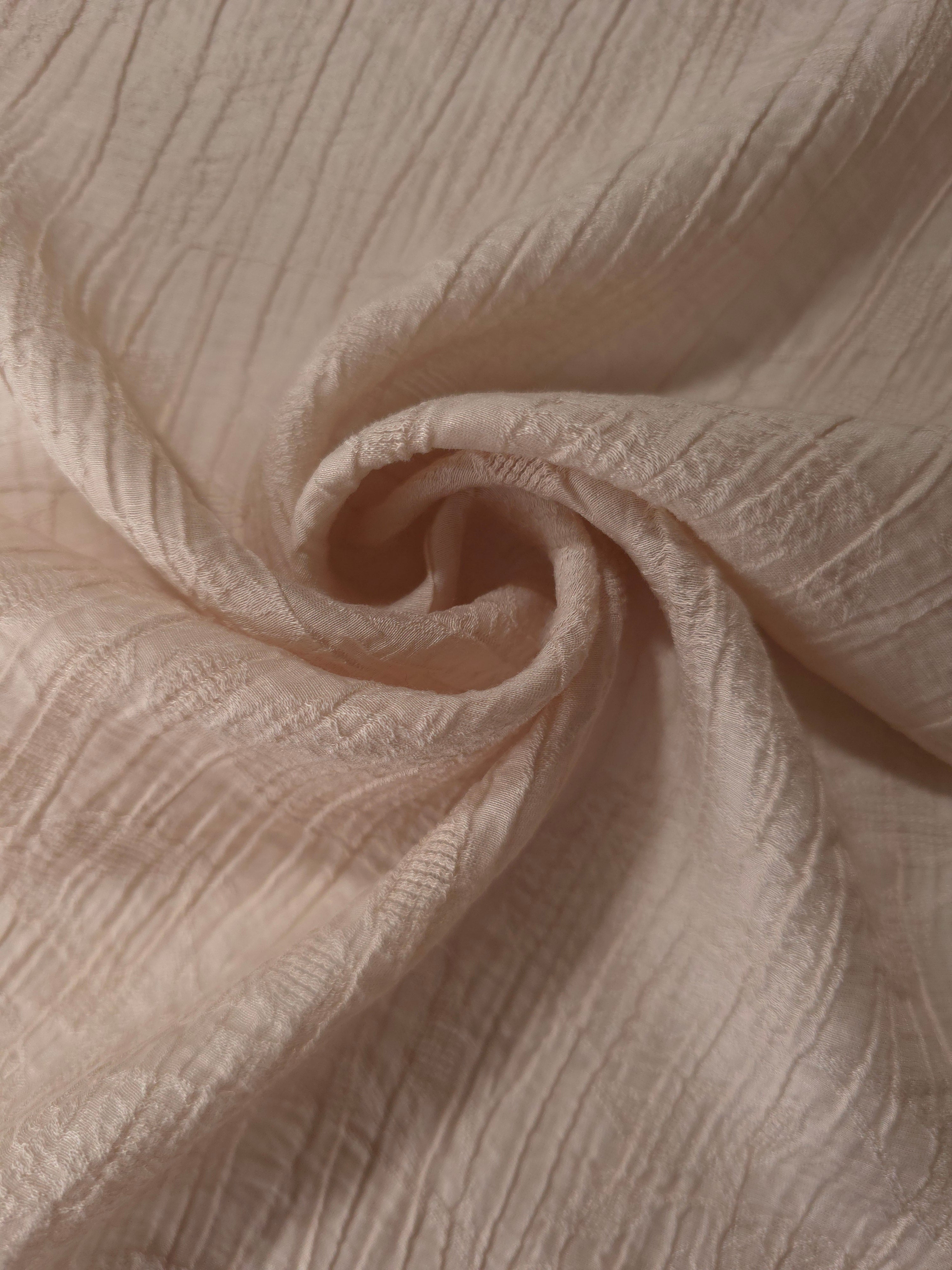Draped Soft Beige Tencel jacquard showing airy movement for kaftans and dresses.