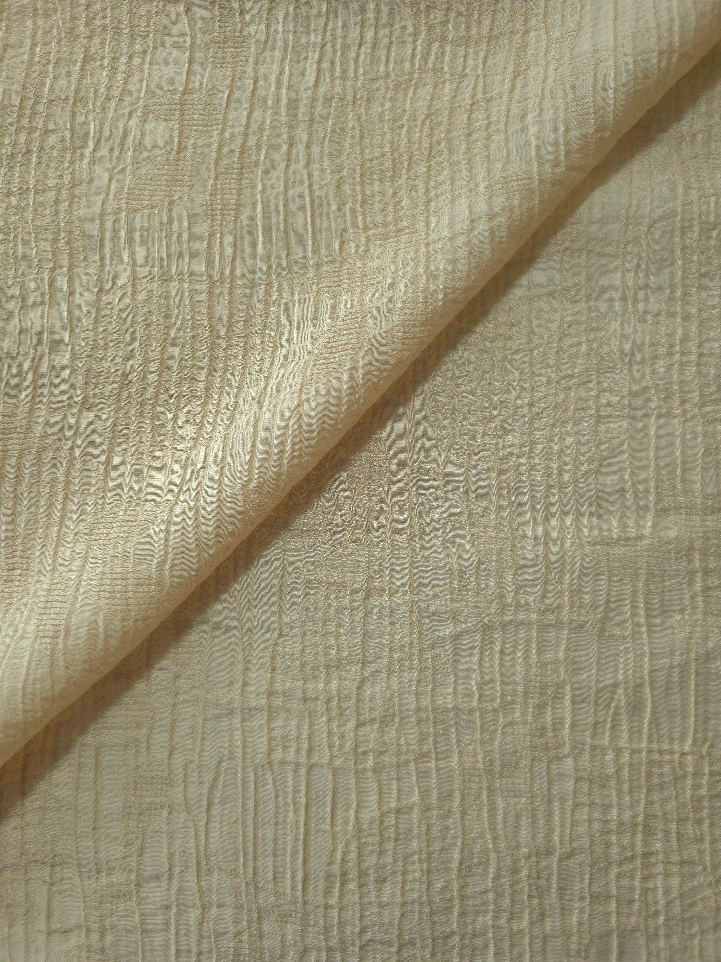 Flat view of Butter Yellow Tencel jacquard with tonal leaf texture for dresses and layers.