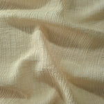 Close-up of Butter Yellow Tencel jacquard showing tonal leaf texture and light weave.