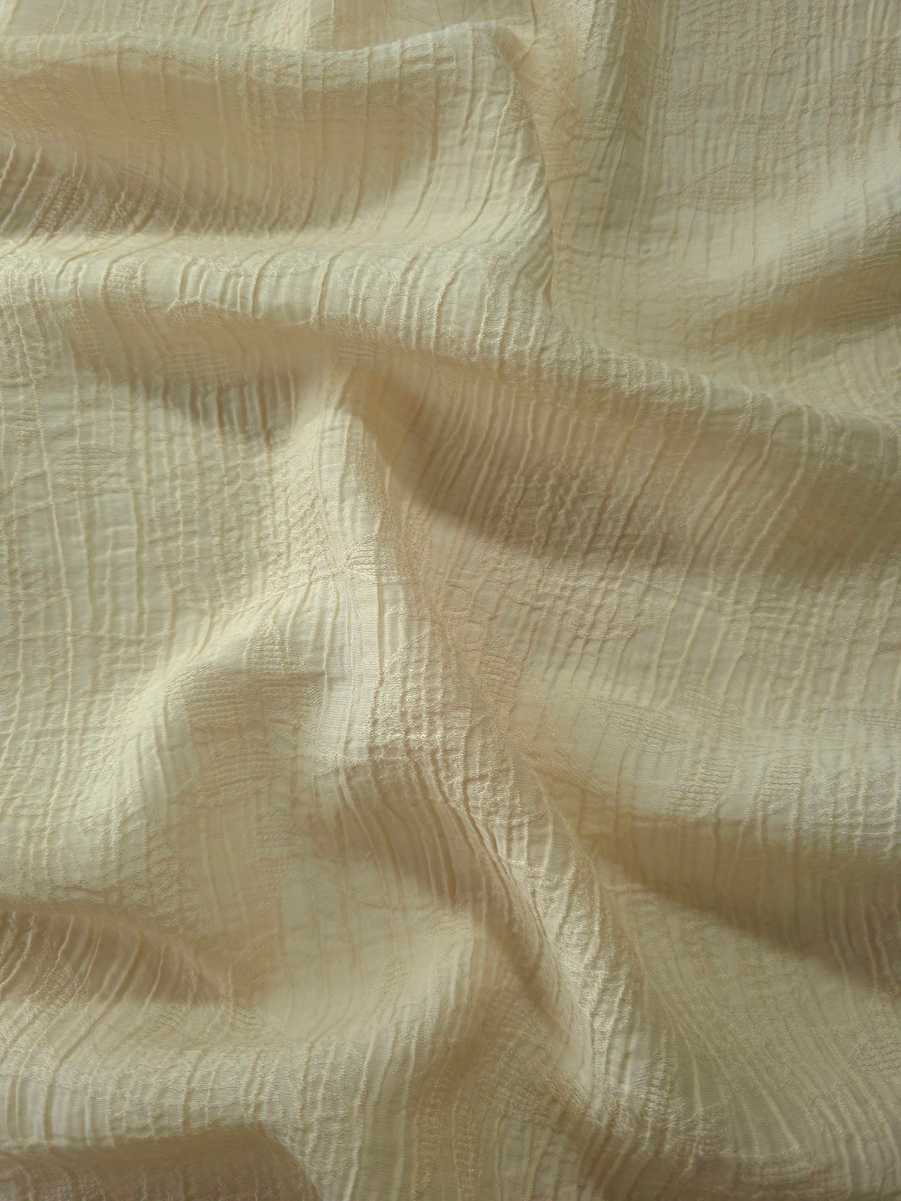 Close-up of Butter Yellow Tencel jacquard showing tonal leaf texture and light weave.