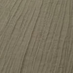 Close-up of Sage Green Tencel jacquard showing fine root line texture and light weave.