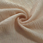 Flat view of Soft Beige Tencel jacquard with tonal stripe texture for dresses and layers.