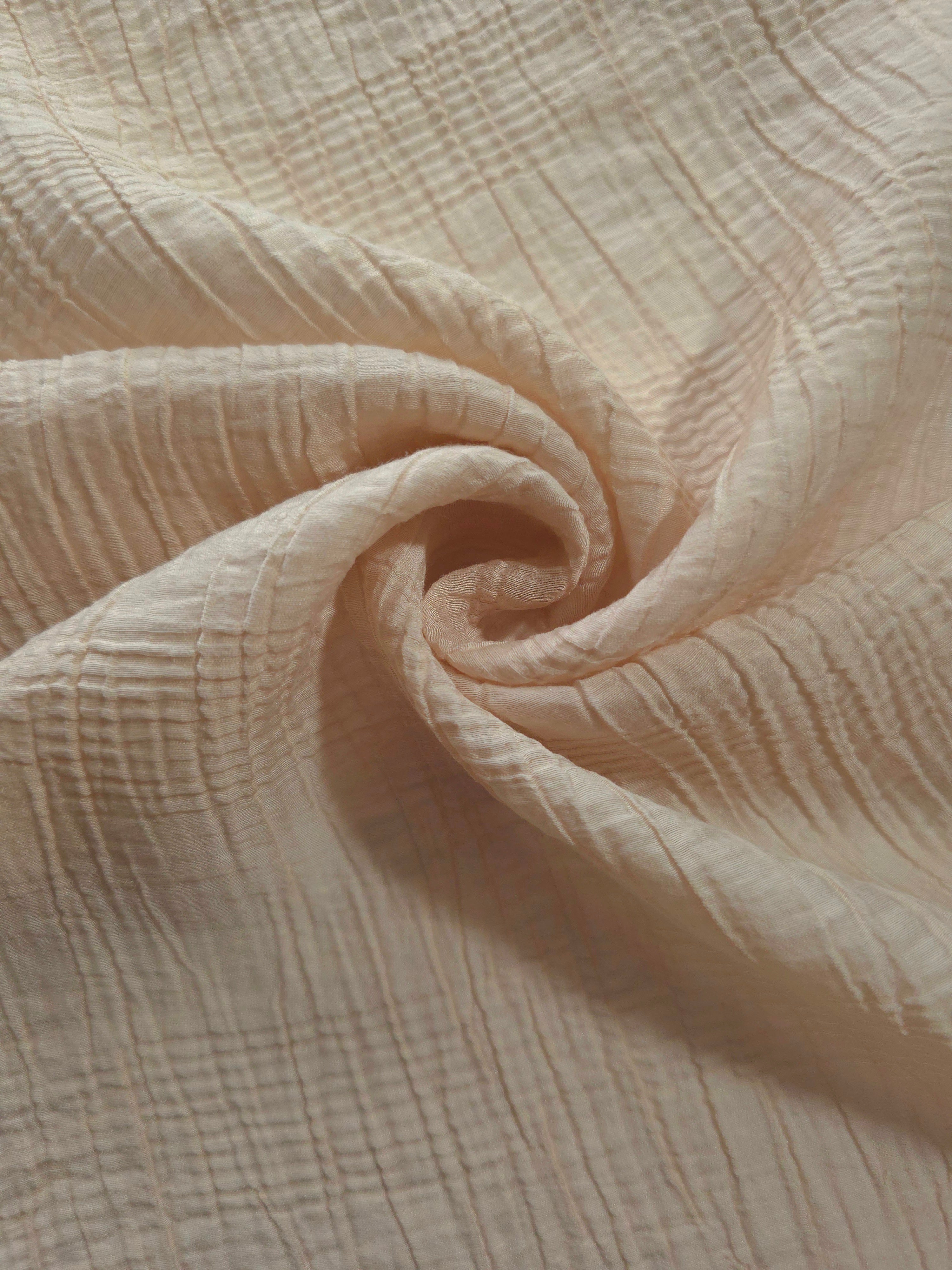 Flat view of Soft Beige Tencel jacquard with tonal stripe texture for dresses and layers.