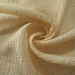 Flat view of Butter Yellow Tencel jacquard with tonal stripe texture for dresses and layers.