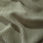 Flat view of Sage Green Tencel jacquard with tonal stripe texture for dresses and layers.