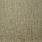 Flowing Butter Yellow Tencel jacquard with tonal leaf texture for lined dress layers.