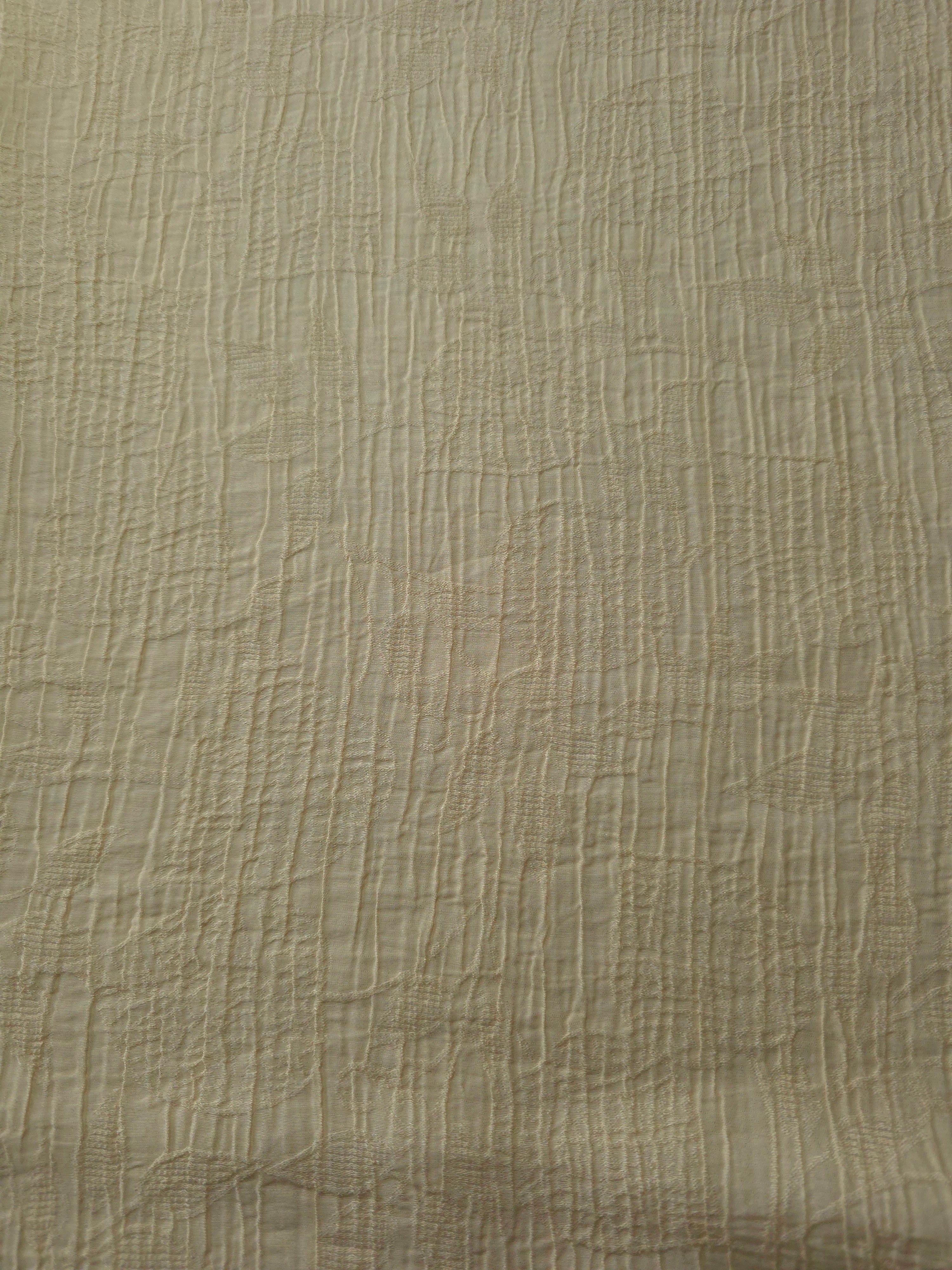 Flowing Butter Yellow Tencel jacquard with tonal leaf texture for lined dress layers.