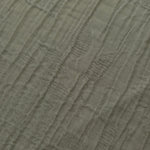 Close-up of Sage Green Tencel jacquard showing tonal leaf texture and light weave.