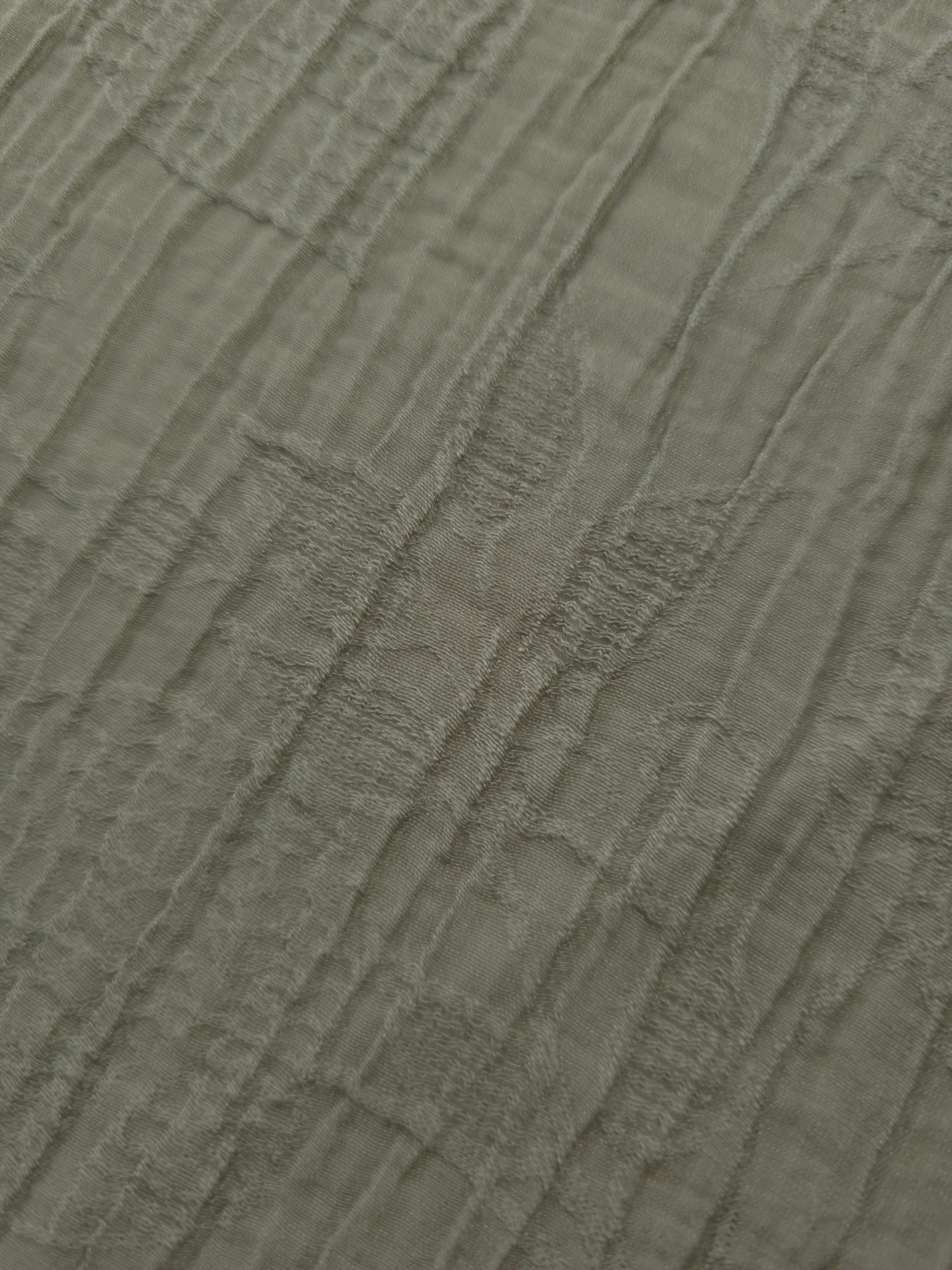 Close-up of Sage Green Tencel jacquard showing tonal leaf texture and light weave.