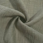 Flowing Sage Green Tencel jacquard with tonal leaf texture for lined dress layers.