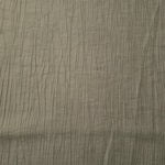 Close-up of Sage Green Tencel jacquard showing tonal petal texture and light weave.