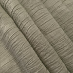 Fold detail of Sage Green Tencel jacquard with tonal petal texture for dressmaking.