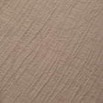 Close-up of Soft Beige Tencel jacquard showing tonal swirl texture and light weave.