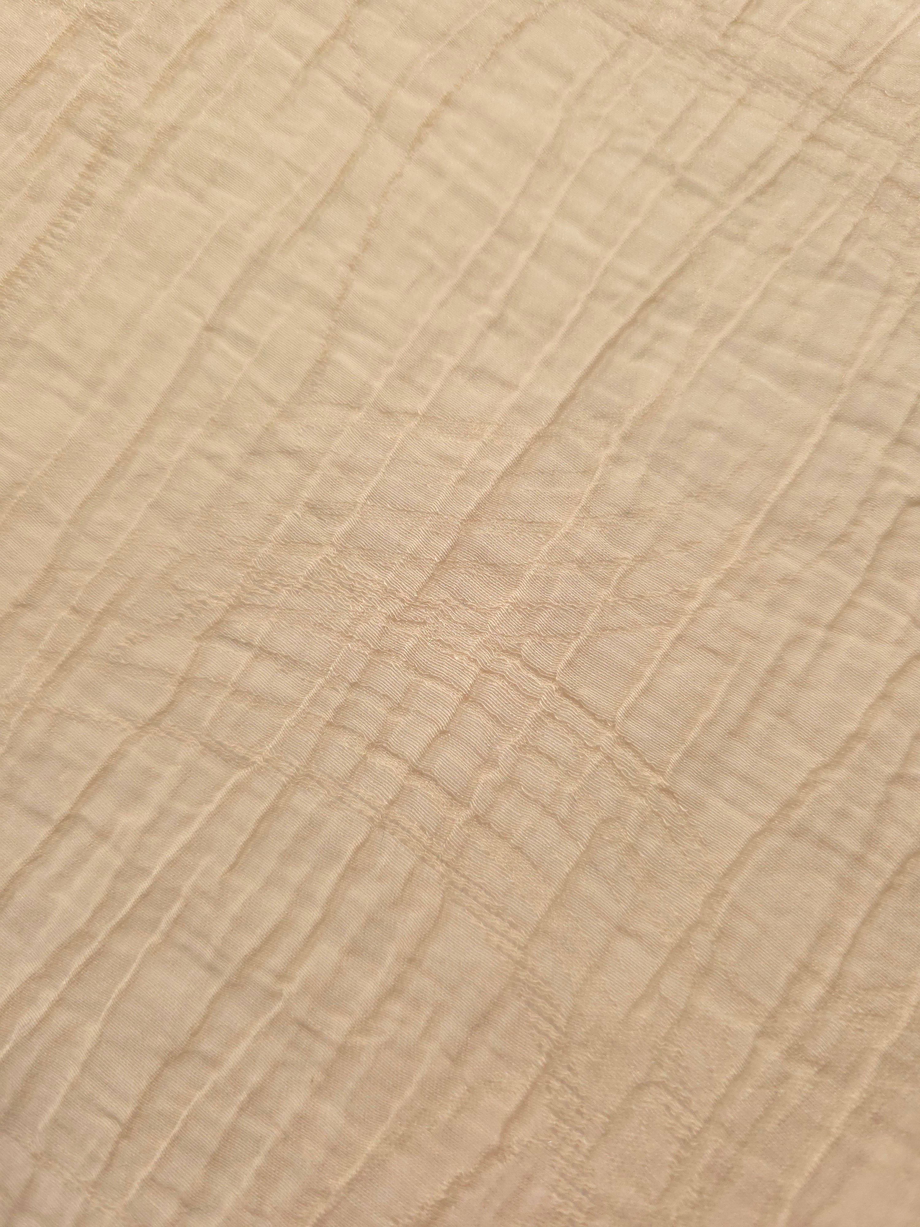 Flat view of Butter Yellow Tencel jacquard with tonal swirl texture for dresses and layers.
