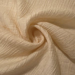 Flowing Butter Yellow Tencel jacquard with tonal swirl texture for lined dress layers.
