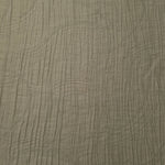 Flat view of Sage Green Tencel jacquard with tonal swirl texture for dresses and layers.