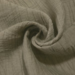 Draped Sage Green Tencel jacquard showing airy movement for kaftans and dresses.