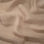Texture view of Soft Beige Tencel jacquard with fine root line texture and soft surface.