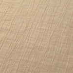 Close-up of Butter Yellow Tencel jacquard showing fine root line texture and light weave.