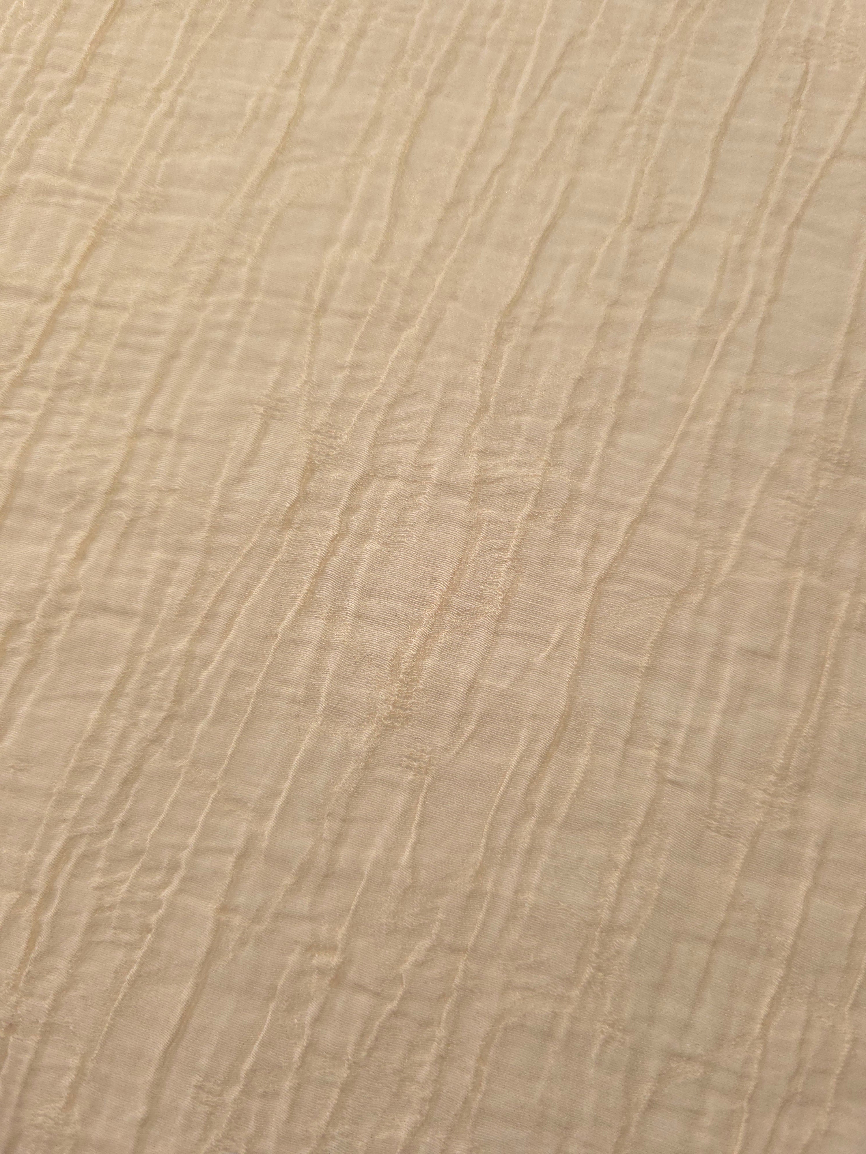 Close-up of Butter Yellow Tencel jacquard showing fine root line texture and light weave.