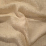 Draped Butter Yellow Tencel jacquard showing airy movement for kaftans and dresses.